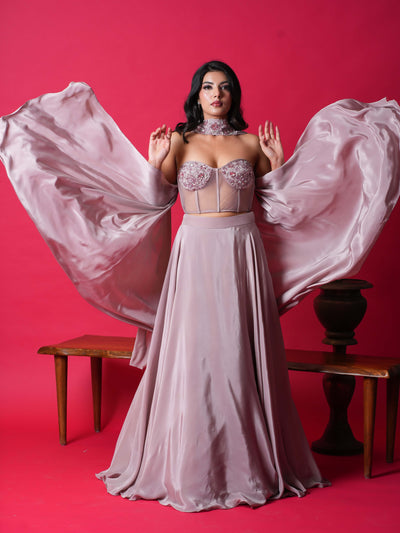 JULIE-The Corset Crop top features stunning handwork on the top, while the skirt and dupatta add an elegant touch. Made with premium Italian Crepe, it's available in four gorgeous colors.