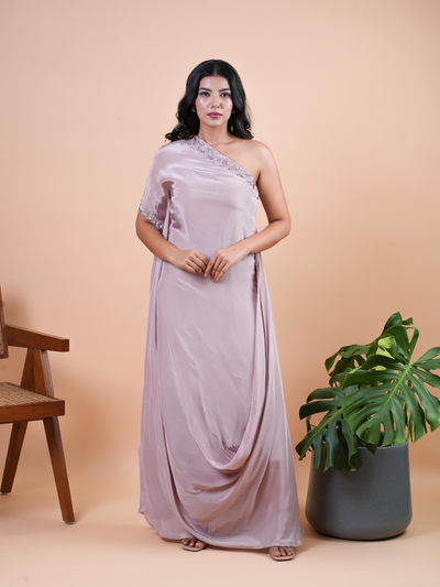 Our ALAYA one shoulder gown. Featuring delicate handwork from the neck to the shoulder .The full-length outfit with a caul in the bottom. Available in four stunning pastel colors.Its a premium Italian crepe.