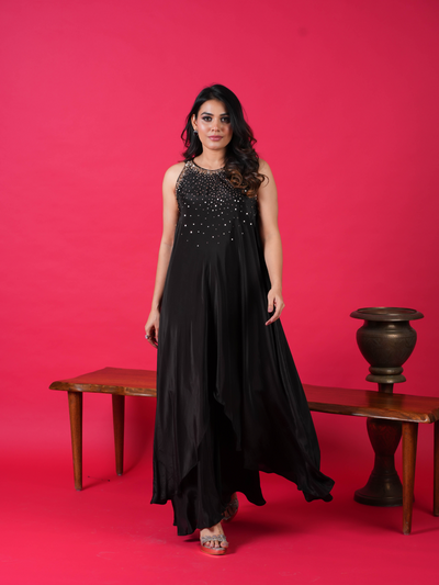 LALYA- Striking long kurta perfect for any occasion. Adorned with intricate sequence work on the neck, this floor-length dress comes with a stylish plazo. Available in two stunning colors. 